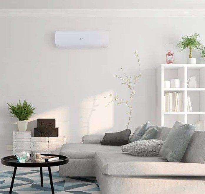 Wall mounted air conditioning unit in a modern bedroom
